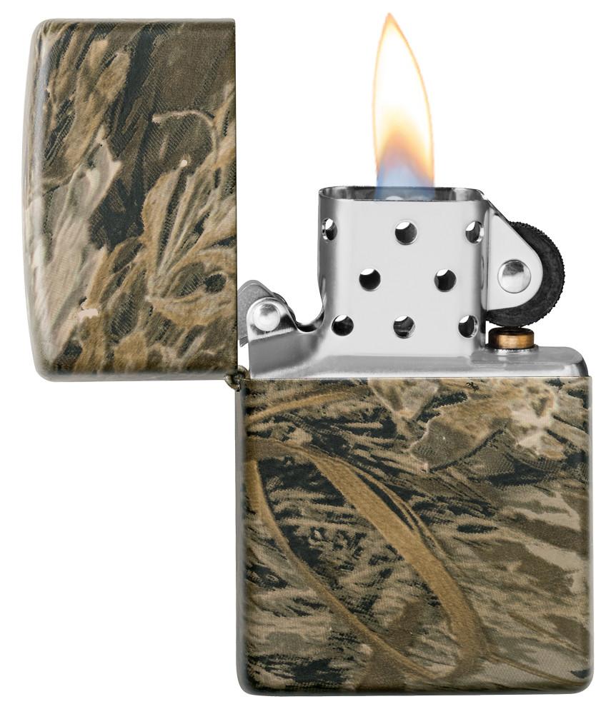 Authentic Zippo Lighter - Realtree Pattern with its lid open and lid